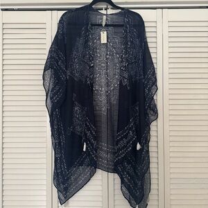 Francesca’s Black and White Sheer Kimono
